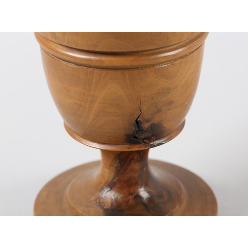 56 - A TURNED FRUITWOOD GOBLET, 17.5cm high