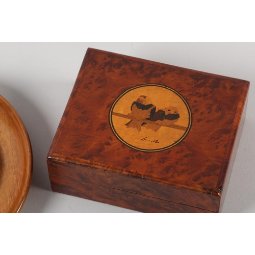 55 - CHARLES SPINDLER (1865-1938), a burr walnut Love Birds' box, inlaid to the lid with two love birds p... 