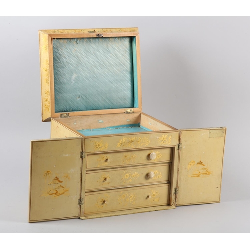 78 - AN EARLY 20TH CENTURY CREAM LACQUERED CHINOISERIE CABINET CHEST, the lid, doors and panels painted w... 