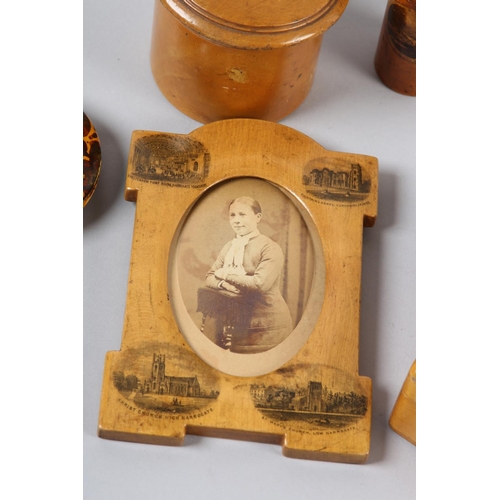 64 - A VICTORIAN MAUCHLINE WARE 'HARROGATE' PHOTOGRAPH FRAME OF ARCHED PROFILE, transferred with views of... 