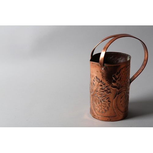 34 - AN ARTS AND CRAFTS COPPER INDOOR WATERING CAN, cylindrical, the rim nipped to create a pouring lip, ... 