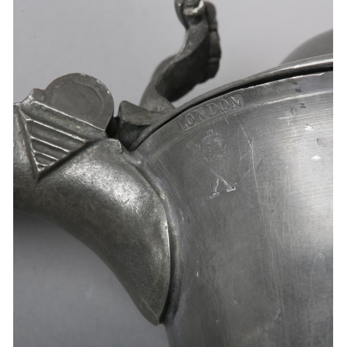 39 - A LARGE PEWTER LIDDED SERVING JUG FOR BEER, of baluster form, the lid with acanthus thumb piece, 'S'... 