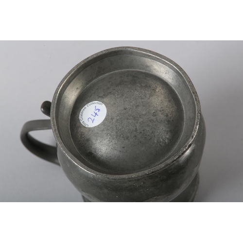 44 - A VICTORIAN HALF PINT PEWTER TANKARD, stamped  and maker's stamp '9' to the rim, 9cm high