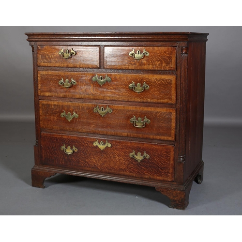 566 - AN 18TH CENTURY OAK AND MAHOGANY BANDED CHEST OF DRAWERS, having a concave edge, above two short and... 