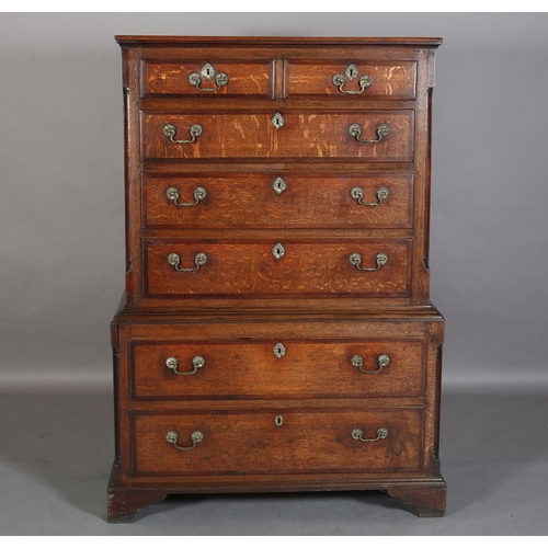 565 - AN 18TH CENTURY OAK AND MAHOGANY BANDED CHEST ON CHEST, having two short over three graduated drawer... 