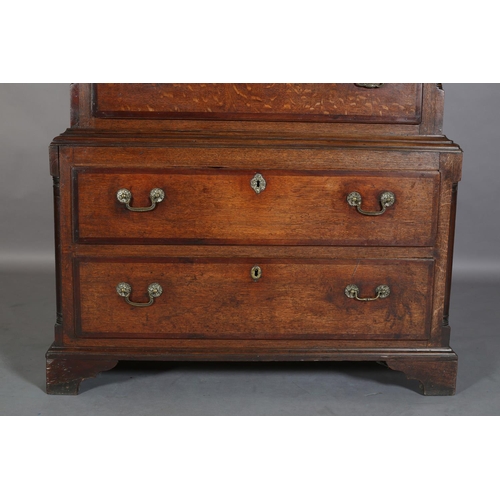 565 - AN 18TH CENTURY OAK AND MAHOGANY BANDED CHEST ON CHEST, having two short over three graduated drawer... 