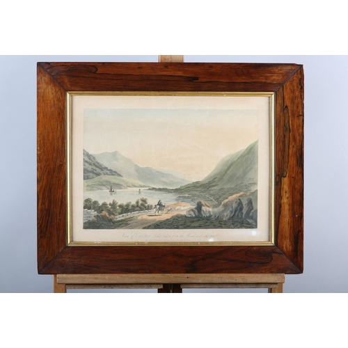 66 - A PAIR OF 19TH CENTURY ROSEWOOD FRAMES WITH GILT SLIP with a pair of coloured lithograph views of Co... 