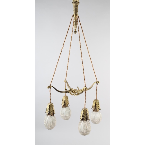 2 - A PAIR OF EARLY 20TH CENTURY FRENCH GILDED BRASS PENDANT LIGHT FITTINGS, each cast as two crossed bo... 