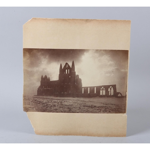 18 - FRANK MEADOW SUTCLIFFE (1853-1941), Whitby Abbey silhouetted against the winter sky, numbered FMS597... 