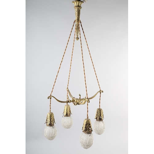 2 - A PAIR OF EARLY 20TH CENTURY FRENCH GILDED BRASS PENDANT LIGHT FITTINGS, each cast as two crossed bo... 