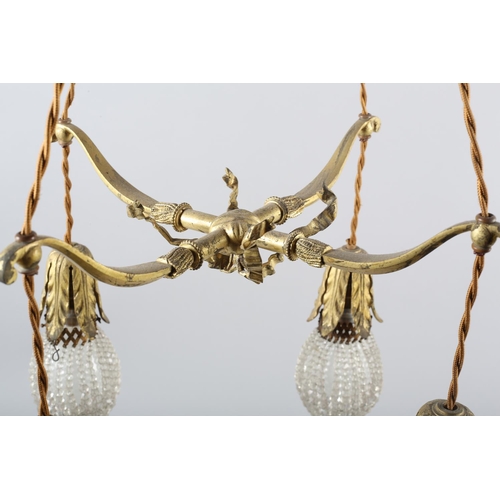 2 - A PAIR OF EARLY 20TH CENTURY FRENCH GILDED BRASS PENDANT LIGHT FITTINGS, each cast as two crossed bo... 