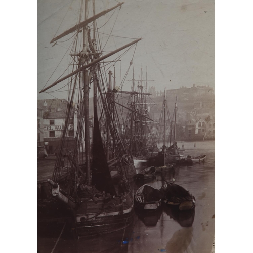 23 - FRANK MEADOW SUTCLIFFE (1853-1941), Whitby Harbour, low tide with moored fishing boats, titled and d... 