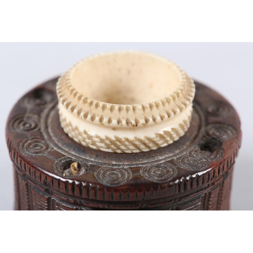 100 - A LATE 18TH/EARLY 19TH CENTURY TREEN INKWELL, of drum shape carved with vertical bands and milled ri... 