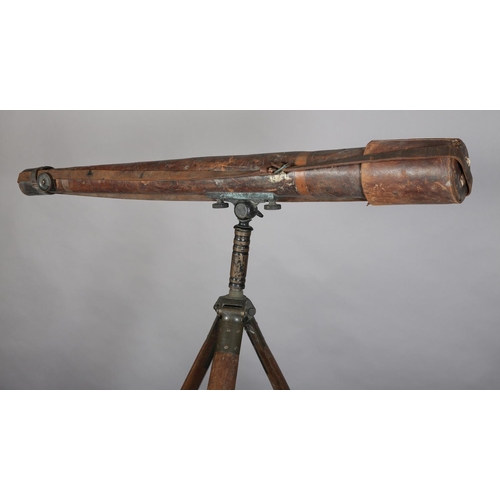 47 - A MILITARY BRASS AND LEATHER TELESCOPE  by W Ottway & Co Ltd, Ealing, London, stamped 1938 no. 1027,... 