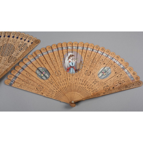 1 - Two late 18th century wood brisé fans, the first with 28 inner sticks and two guards, rounded tips, ... 