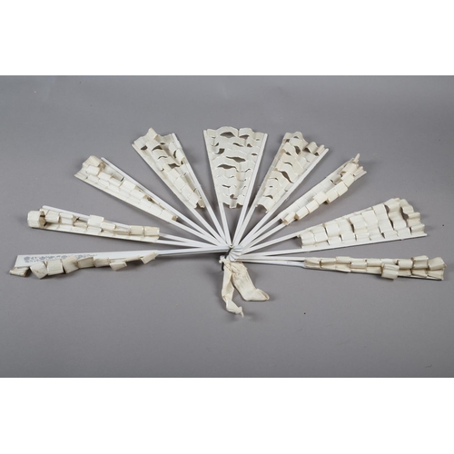 10 - A French silk “Trick” fan or eventail à dislocation, the complex bands of cream silk ribbon mounted ... 