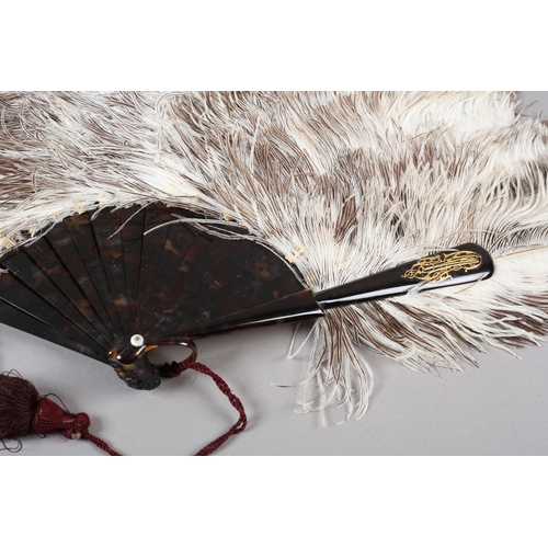 105 - A Duvelleroy female ostrich feather fan, mounted on tortoiseshell, marked “Duvelleroy” in gold on th... 