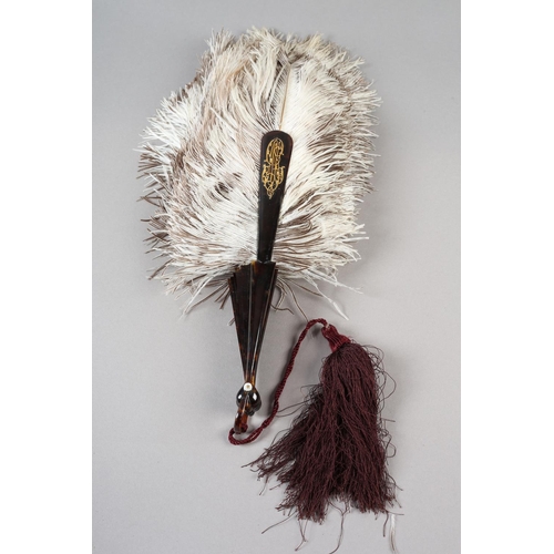 105 - A Duvelleroy female ostrich feather fan, mounted on tortoiseshell, marked “Duvelleroy” in gold on th... 