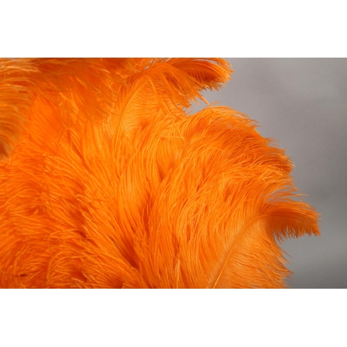 108 - 1920’s vibrant orange ostrich feather fan, large and showy, the monture of tortoiseshell, frothy fea... 