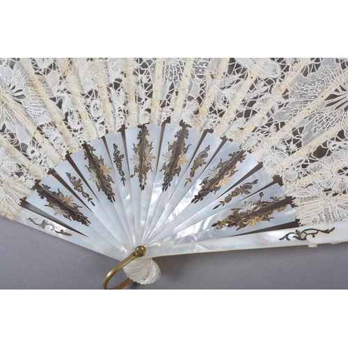 147 - A Mixed Brussels lace fan, late 19th/ early 20th century, the monture of white mother of pearl, gild... 