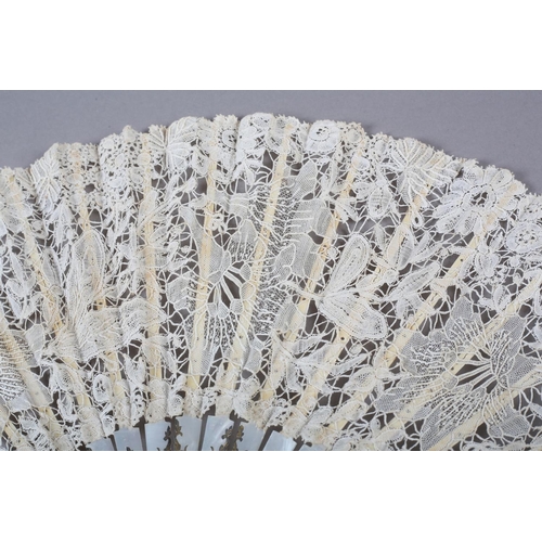 147 - A Mixed Brussels lace fan, late 19th/ early 20th century, the monture of white mother of pearl, gild... 