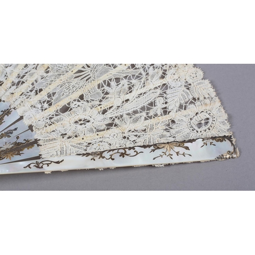 147 - A Mixed Brussels lace fan, late 19th/ early 20th century, the monture of white mother of pearl, gild... 