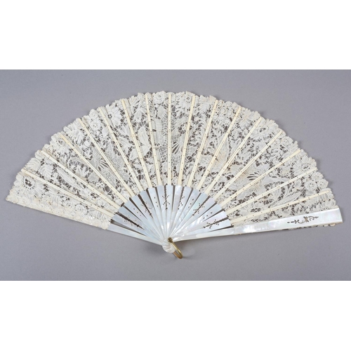 147 - A Mixed Brussels lace fan, late 19th/ early 20th century, the monture of white mother of pearl, gild... 