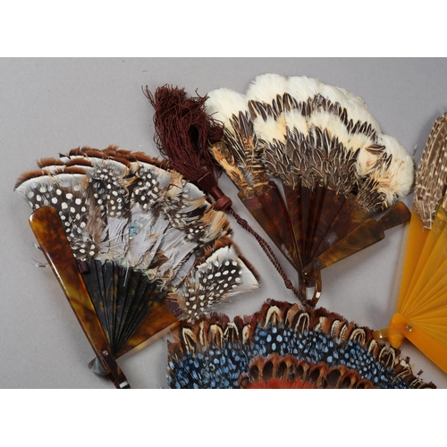 15 - Four 19th century feather fans, in marquetry form, the first in tortoiseshell with three varieties o... 