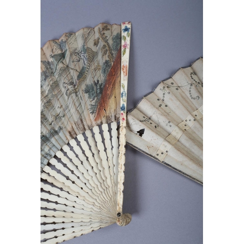 2 - An 18th century bone fan, the upper guards painted in chinoiserie fashion, the sticks carved as to b... 