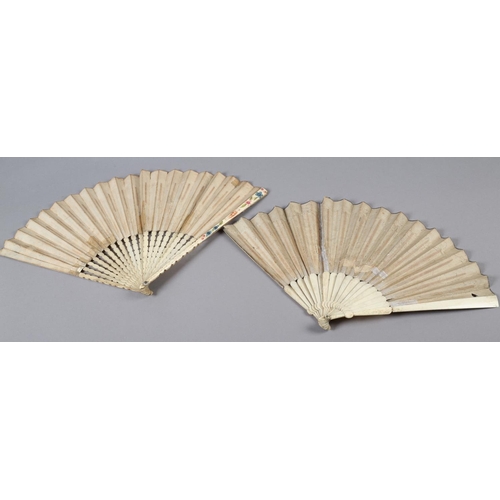 2 - An 18th century bone fan, the upper guards painted in chinoiserie fashion, the sticks carved as to b... 