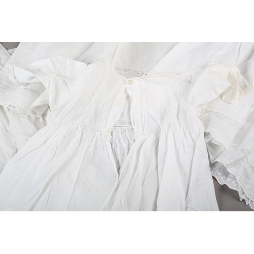 214 - 19th and 20th century christening gowns, one Regency, and children’s dresses (5)