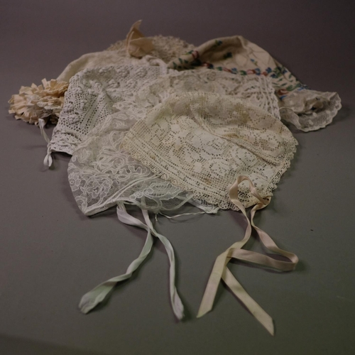 222 - Baby/young child’s bonnets, 19th and 20th century, to include an unusual tatted example; a knitted b... 