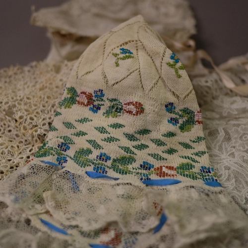 222 - Baby/young child’s bonnets, 19th and 20th century, to include an unusual tatted example; a knitted b... 