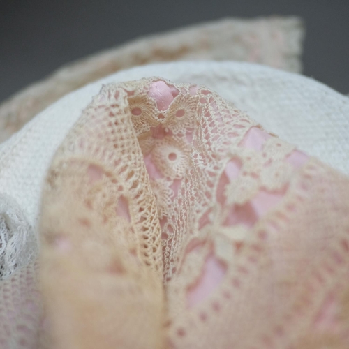 223 - Baby/young child’s bonnets, 19th and 20th century, to include a sprigged cotton bonnet with finely w... 