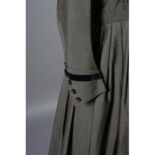 267 - A simple mid-19th century grey wool dress with fitted bodice, gathered skirt, the bodice lined in cr... 