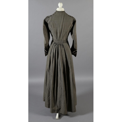 267 - A simple mid-19th century grey wool dress with fitted bodice, gathered skirt, the bodice lined in cr... 