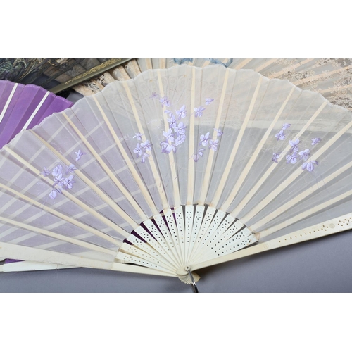 27 - Four late Victorian/Edwardian fans, summer colours and weight, one with a gauze leaf painted with a ... 