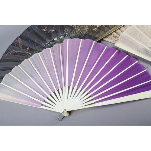 27 - Four late Victorian/Edwardian fans, summer colours and weight, one with a gauze leaf painted with a ... 