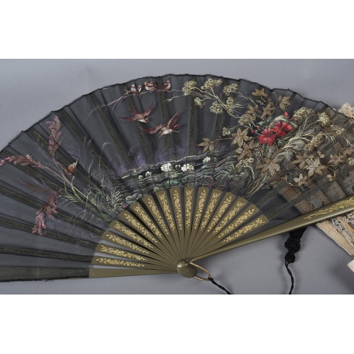 27 - Four late Victorian/Edwardian fans, summer colours and weight, one with a gauze leaf painted with a ... 