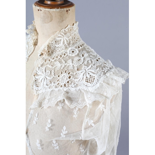 270 - Antique Lace: a handmade lace jacket, hip length, shaped, Milanese bobbin lace, seemingly constructe... 