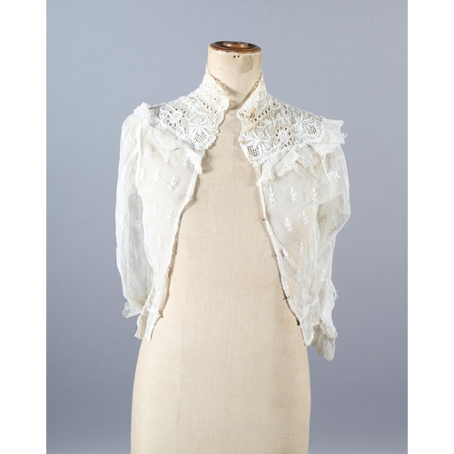 270 - Antique Lace: a handmade lace jacket, hip length, shaped, Milanese bobbin lace, seemingly constructe... 