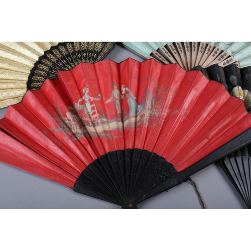 28 - Four large late 19th century fans, all with wood montures, three with a fabric leaf, one of paper, a... 