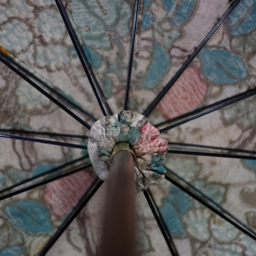 288 - 1920’s Parasols: four examples, three with floral printed covers, one of paper, three with painted w... 