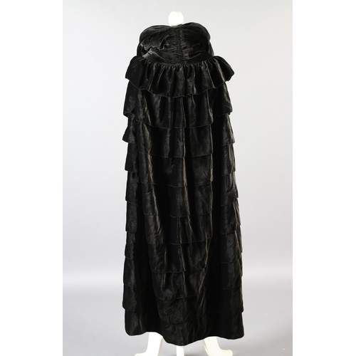 299 - A 1920’s opera cape in soft and fluid chocolate velvet, black silk lining, ruched collar with top bu... 