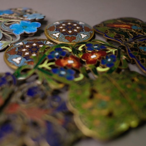 304 - Cloisonné enamel belt buckles, Art Nouveau and later, one pair in shades of turquoise with meanderin... 