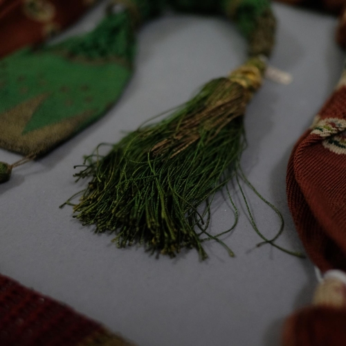 317 - Four good 19th century miser’s purses, to include a green example incorporating gold metal thread to... 