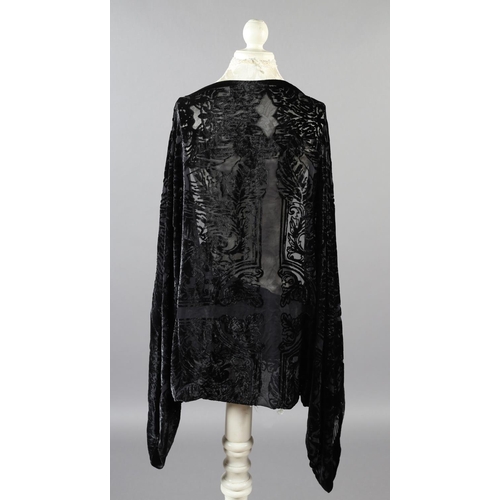 355 - Two 20th century black cut velvet garments, one a draped top, hip-length, the other a fringed shawl,... 