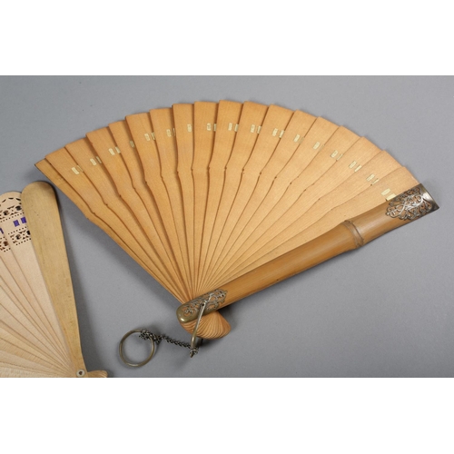 61 - 19th century wood brisé fans, c1880’s, probably Austrian, the first a sturdy example with heavier gu... 