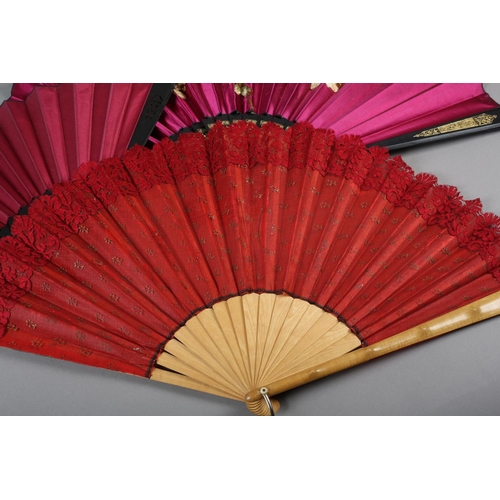 62 - Three late 19th century fans, all with wood montures, with decorative gilding, the cerise silk leaf,... 