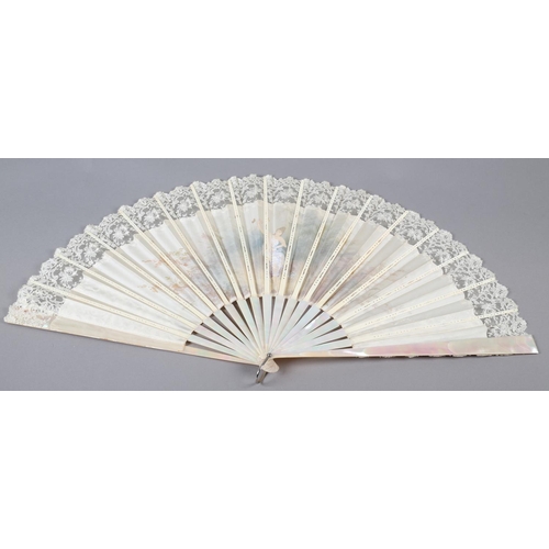 79 - c.1890’s, a large and showy painted silk fan, the cream silk edged in cream machine lace, the centra... 